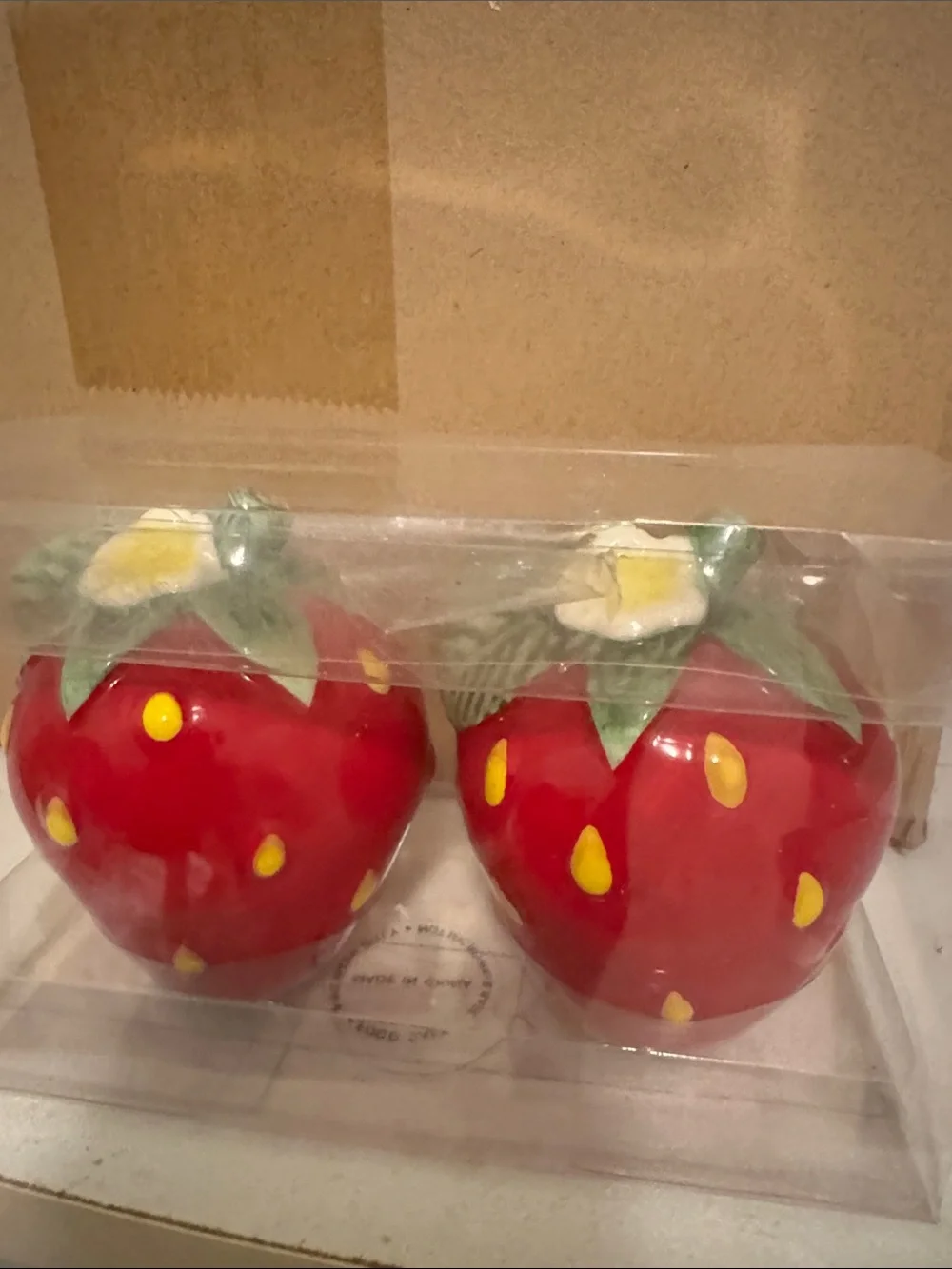 The Spring Shop Red Strawberry Ceramic Salt and Pepper Shakers with Green Tops